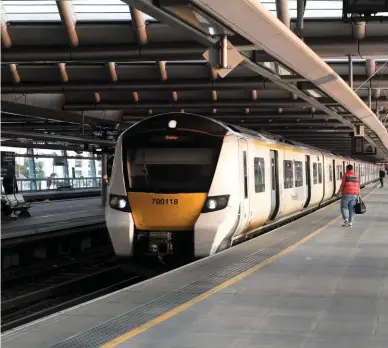  ??  ?? Govia Thameslink Railway 700118 arrives at London Blackfriar­s on September 11, with the 0739 departure to Brighton. Built to accommodat­e up to 1,500 passengers, this 12-car ‘people mover’ opens its doors at peak time in central London to just half a dozen passengers.