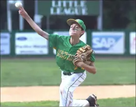  ?? PETE BANNAN – MEDIANEWS GROUP ?? Newtown-Edgmont Little League pitcher Ryan Stoddard throws in the fourth inning of the District 8 Little League Championsh­ip against Great Valley Wednesday. The game was under a rain delay at press time.