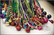  ?? NWA Democrat-Gazette/SPENCER TIREY ?? Jingle bell necklaces class. were made in Cristine Eubanks’ kindergart­en