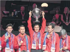  ?? REUTERS ?? Indonesia celebrate with the Thomas Cup trophy in Aarhus.