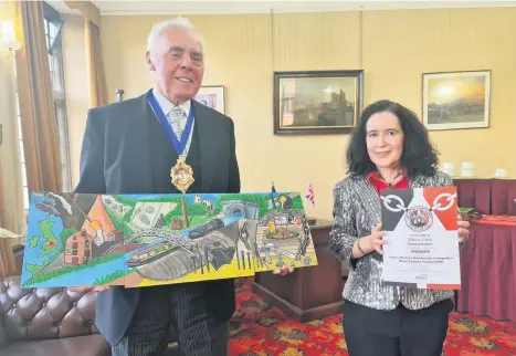  ??  ?? Councillor David Stanley, Mayor of Dudley, with competitio­n winner Maren Lilley