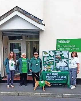  ??  ?? ● The Macmillan team at the vintage vehicle fundraiser hosted by Southport Auto Centre in July