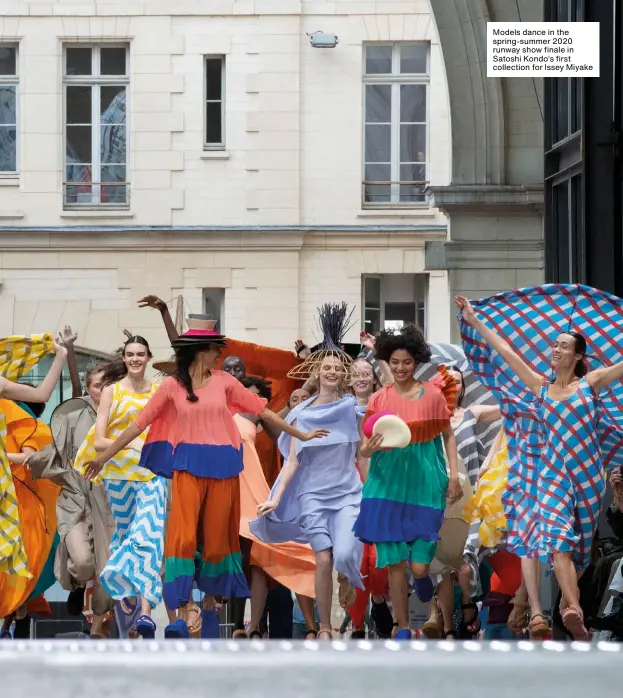  ??  ?? Models dance in the spring-summer 2020 runway show finale in Satoshi Kondo’s first collection for Issey Miyake