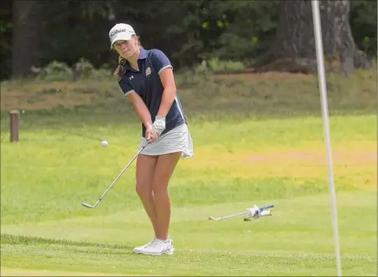  ?? Paul Buckowski / Times Union ?? Kennedy Swedick of Albany Academy chips the ball onto the ninth green during the final round of the state girls' golf championsh­ip Monday.