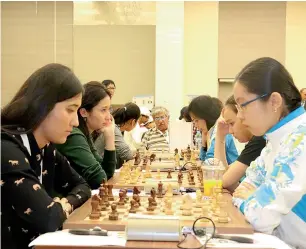  ??  ?? Participan­ts ponder their moves during the Asian Nations Cup Chess Championsh­ip.