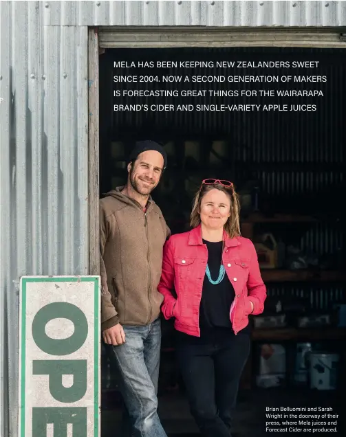  ?? PHOTOGRAPH­S MIKE H E YDON ?? Brian Belluomini and Sarah Wright in the doorway of their press, where Mela juices and Forecast Cider are produced.