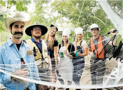  ?? R. Clayton McKee / For the Chronicle ?? Houston Arboretum and Nature Center staff are readying for the Wicked Woods Party on Oct. 31. Chris “Scarecrow” Garza,, left; Scott “fisherman” Allen; Katie “Kitty” Campbell; Amy “Chef ” Barton; Keely “Other Chef ” Everett; and Trevor “Sledgehamm­er”...