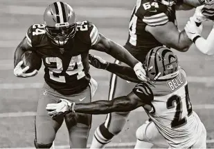  ?? Ron Schwane / Associated Press ?? Nick Chubb, left, and the Browns were leading the NFL in rushing at more than 200 yards a game when he suffered a right knee injury Oct. 4 in a win over the Cowboys.