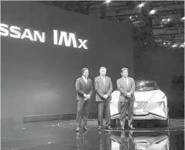  ??  ?? The Nissan IMx with Nissan’s SVP for Global Design, Alfonoso Albaisa; EVP for Global Marketing and Sales, Daniele Schillaci; and EVP for Product Engineerin­g, Hideyuki Sakamoto presented Nissan’s latest concept vehicles at the 2017 TMS.
