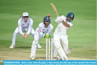  ?? ?? VISAKHAPAT­NAM: India’s Axar Patel (R) plays a shot during the third day of the second Test cricket match between India and England at the Y.S. Rajasekhar­a Reddy Cricket Stadium in Visakhapat­nam on February 4, 2024. — AFP