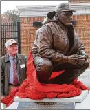  ?? STAFF FILE ?? A statue of former Yale coach and former Miami assistant Carmen Cozza (left) is on display at Miami University’s Cradle of Coaches Plaza. It was unveiled Oct. 23, 2010.