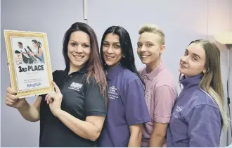  ??  ?? Gym of the Year 3rd place - Ami Veni, Liliana Dousa, Aleks Majer and Brooke Allen at the Fitness Zone in Wentworth Street, Peterborou­gh City Centre.