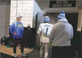  ?? Robert Gauthier Los Angeles Times ?? CHARGERS COACH Brandon Staley, left, stands outside the locker room after the team’s stunning, 31-30 wild-card playoff loss Saturday night at Jacksonvil­le.