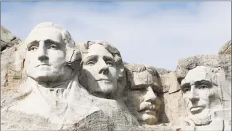  ?? David Zalubowski / Associated Press file photo ?? President Donald Trump began his Independen­ce Day weekend Friday with a patriotic display of fireworks at Mount Rushmore National Memorial in Keystone, S.D., before a crowd of thousands.