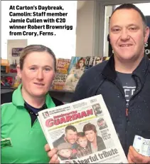  ??  ?? At Carton’s Daybreak, Camolin: Staff member Jamie Cullen with €20 winner Robert Brownrigg from Crory, Ferns .