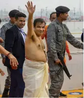  ?? PTI ?? Union minister Nitin Gadkari arrives at Sangam to take a holy dip during Kumbh Mela on Friday. —