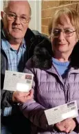  ?? ?? TOP LEFT: Jan and Terry Chudley with the postcards that took seven years to arrive.