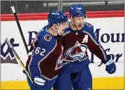  ?? ANDY CROSS — THE DENVER POST ?? Colorado Avalanche center Nathan MacKinnon (29) celebrates with Colorado Avalanche left wing Artturi Lehkonen (62) after scoring a goal against New Jersey Devils goaltender Vitek Vanecek (41) in the second period at Ball Arena March 01, 2023.