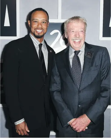  ?? GUSTAVO CABALLERO / GETTY IMAGES FILES ?? Tiger Woods and Nike co-founder Phil Knight had a long but unprofitab­le relationsh­ip.
