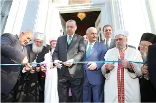  ??  ?? Turkish President Recep Tayyip Erdogan and Bulgaria’s Prime Minister Boyko Borissov attend re-opening of the St. Stefan Bulgarian Orthodox Church in Istanbul, on Sunday. (Reuters)