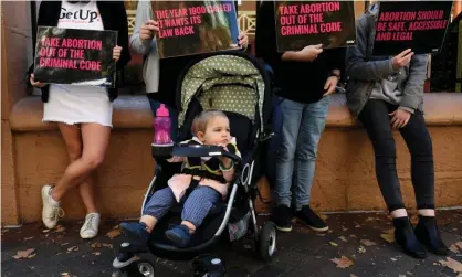  ?? Photograph: Paul Miller/AAP ?? Protesters in favour of the decriminal­isation of abortion. Labor for Choice says it wants Labor to remove its guarantee of a conscience vote on abortion.