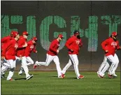  ?? PATRICK SEMANSKY — THE ASSOCIATED PRESS ?? Members of the Nationals work out on Friday in Washington, in advance of the team’s appearance in the World Series.