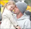  ??  ?? CRITICISED: David Beckham shares a kiss with his daughter Harper.