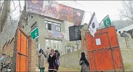  ?? WASEEM ANDRABI / HT ?? House of suicide attacker Fardeen in Kashmir’s Tral is adorned with his posters.