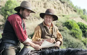  ?? ANNAPURNA PICTURES ?? Joaquin Phoenix, left, and John C. Reilly are convincing brothers in this classic western, which never deviates far from what we have come to expect — and savour — about the traditiona­l genre.