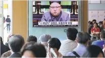  ?? AHN YOUNG-JOON/AP PHOTO ?? People watch North Korean leader Kim Jong Un delivering a statement Friday in response to U.S. President Donald Trump’s speech.