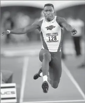  ?? NWA Democrat-Gazette/ANDY SHUPE ?? Senior Clive Pullen, who won the triple jump in the SEC Indoor and Outdoor Track and Field Championsh­ips last year, has been hampered by a hamstring injury, but the Jamaica native is set to finish off his Arkansas career today at the NCAA Outdoor Track...