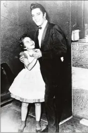  ?? COURTESY OF BRENDA LEE ARCHIVES ?? Singer Brenda Lee is seen as a child with Elvis Presley, who came to see her inaugural performanc­e at the Grand Ole Opry.