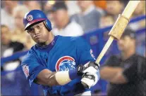  ?? RON FREHM/AP ?? The most expedient way to end the standoff between Sammy Sosa and the Ricketts might be for Sosa to purchase a ticket into Wrigley Field.