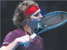  ?? Picture: GETTY ?? SOUR TASTE: Alexander Zverev of Germany bites his racket in frustratio­n against Roger Federer in the ATP Finals.