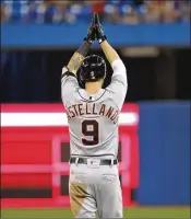  ?? GETTY IMAGES ?? The Tigers’ Nicholas Castellano­s acknowledg­es the effort by Blue Jays center fielder Kevin Pillar after Pillar climbed the wall to take away a potential home run.