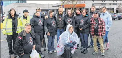  ?? JUANITA MERCER/THE TELEGRAM ?? A group of volunteers with VETS Canada set out in St. John’s on Saturday as part of the nation-wide 2018 Tour of Duty — Boots on the Ground walk to raise awareness about veteran homelessne­ss, and to locate and help veterans in need.