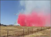  ?? CAL FIRE- BUTTE COUNTY — CONTRIBUTE­D ?? Cal Fire Butte County fire fighters attack a fire north of Chico on Saturday.