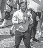  ?? ROBERT FRANKLIN/AP ?? Notre Dame defensive coordinato­r Marcus Freeman is a native of Huber Heights and was formerly an assistant coach for Cincinnati.