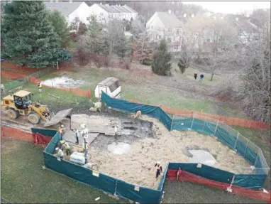  ?? SUBMITTED PHOTO ?? An overhead photo shows sinkholes believed to be tied to pipeline constructi­on behind a home on Lisa Drive in West Whiteland Township.