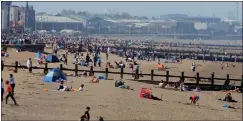  ??  ?? „ Thousands of families headed to Portobello beach on the east coast.