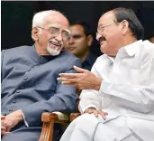  ?? — PTI ?? Outgoing Vice-President Hamid Ansari with VicePresid­ent-designate M. Venkaiah Naidu at the Parliament in New Delhi on Thursday.