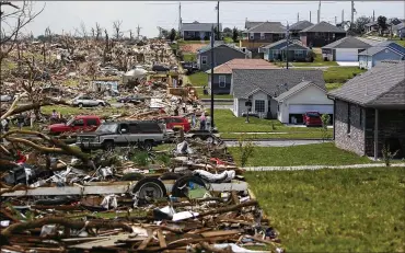  ?? CONTRIBUTE­D BY THE SPRINGFIEL­D NEWS-LEADER ?? A 2016 photo composite of Joplin shows how the community looked in the days after a devastatin­g 2011 tornado and how it had recovered five years later.