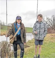  ?? ?? Young anglers Iona Somerville and Thomas Robertson at the Allan Water opening ceremony
