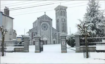  ??  ?? Brrr: St Mary’s Church looking seasonal in the snow earlier this year.