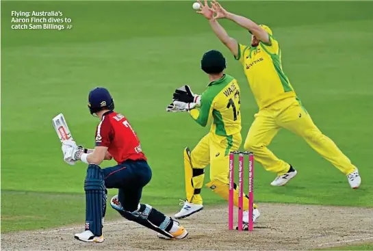  ?? AP ?? Flying: Australia’s Aaron Finch dives to catch Sam Billings