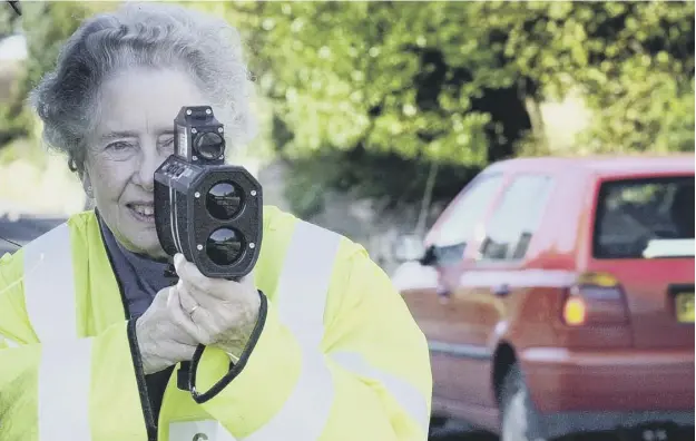  ??  ?? 0 Members of the community wielding speed guns could be a familiar sight on the streets of Edinburgh as a new motoring safely initiative proposal is examined
