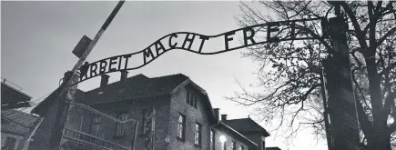  ??  ?? The main entrance to Auschwitz I with the Nazi slogan Arbeit Macht Frei — a German phrase meaning “work will set you free.”