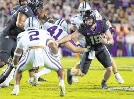  ?? Richard W. Rodriguez
The Associated Press ?? TCU, with quarterbac­k Max Duggan (15), avoided an upset Saturday against Kansas State, coming back to win 38-28 in Fort Worth, Texas. The No. 8 Horned Frogs closed as 3-point favorites.