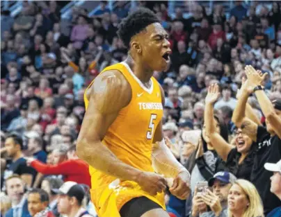  ?? AP PHOTO/DARRYL WEBB ?? Tennessee’s Admiral Schofield celebrates the Vols’ 76-73 victory over No. 1 Gonzaga Sunday in Phoenix. Schofield scored 30 points.