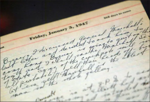  ?? RICK BOWMER / ASSOCIATED PRESS ?? A portion of a page from Harry Truman’s 1947 presidenti­al diary is shown in 2003 at the National Archives in Washington. Presidents from George Washington to Joe Biden have kept presidenti­al diaries. In them, they confide in themselves, express raw opinions, trace even the humdrum habits of their day and offer insight-on-the-fly on monumental decisions of their time. It’s where they may also spill secrets they shouldn’t.